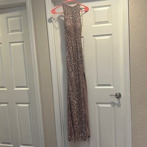 I am selling a rose gold maxi dress only worn once